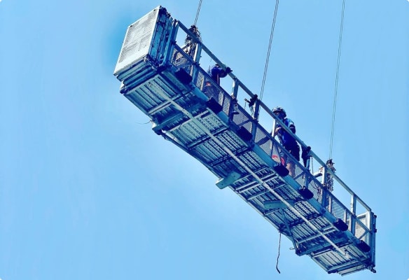 Top Team commercial window cleaning on lift