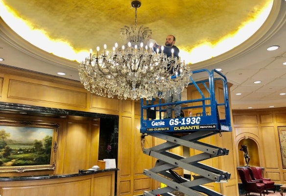 Top team commercial window cleaning on a scissor lift